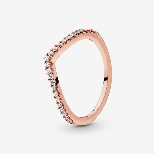 Sparkling Wishbone Ring - Pandora West Africa Rings Make all your wishes come true with this delicate Sparkling Wishbone Ring, lined with cubic zirconia stones on a 14k rose gold-plated band. Simple yet elegant, this wishbone-shaped ring can be worn on its own as a shimmering statement, or paired with other Pandora stackable rings to create a unique, highly individual look. (186316CZ-56)  