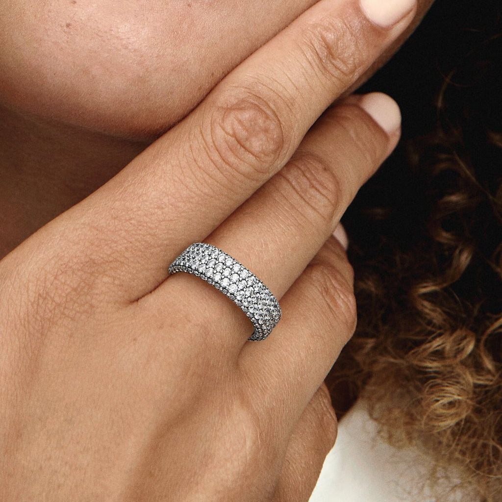 Pandora Timeless Pavé Triple-row Ring - Pandora West Africa Rings Maximize your sparkle with our hand-finished Pandora Timeless Pavé Triple-row Ring. Crafted from sterling silver, this stand-out ring features three rows of clear cubic zirconia around the center and one row facing outwards around each side, creating a slightly rounded square profile that sparkles from every angle. Wear it on its own or stacked with other Timeless Pavé rings to create as bold of a look as you want.(192634C01-52)  