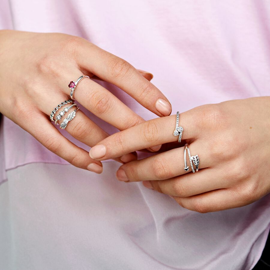 Celestial Stars Ring - Pandora West Africa Rings Aim for the moon and you'll land among the stars, as the famous saying goes. Capture the enchantment and wonder of the vast night sky with a delicate sterling silver ring featuring sparkling clear stones in dreamy starry shapes. Wear as a reminder to keep the magic alive in your day to day life, or keep it as a special occasion piece, which you bring out whenever you want to dazzle with your individual style. (198492C01-48)  