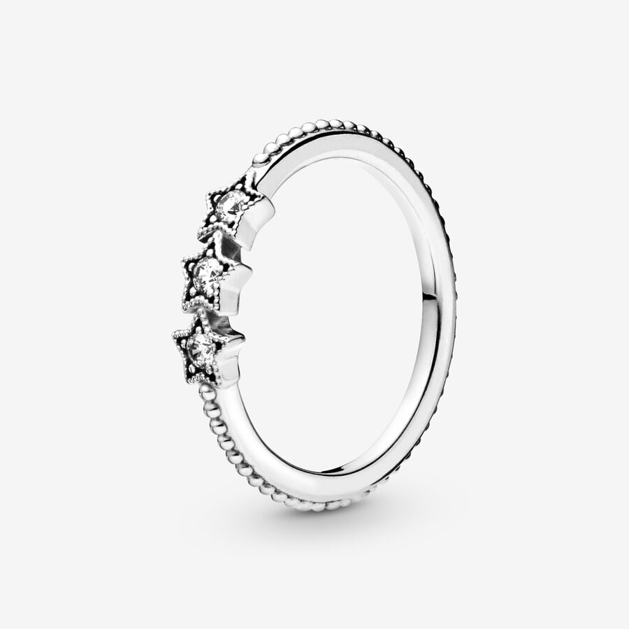 Celestial Stars Ring - Pandora West Africa Rings Aim for the moon and you'll land among the stars, as the famous saying goes. Capture the enchantment and wonder of the vast night sky with a delicate sterling silver ring featuring sparkling clear stones in dreamy starry shapes. Wear as a reminder to keep the magic alive in your day to day life, or keep it as a special occasion piece, which you bring out whenever you want to dazzle with your individual style. (198492C01-48)  