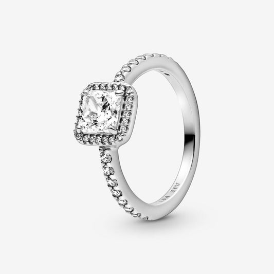 Square Sparkle Halo Ring - Pandora West Africa Jewelry This stunning vintage-inspired ring is one you'll treasure forever. Crafted in sterling silver, this sophisticated style is embellished with sparkling cubic zirconia stones and features a large, square-cut stone as the centerpiece. Wear it on its own as a statement cocktail ring, or style it with contrasting Pandora rings for a fresh, contemporary look. (198863C01)  