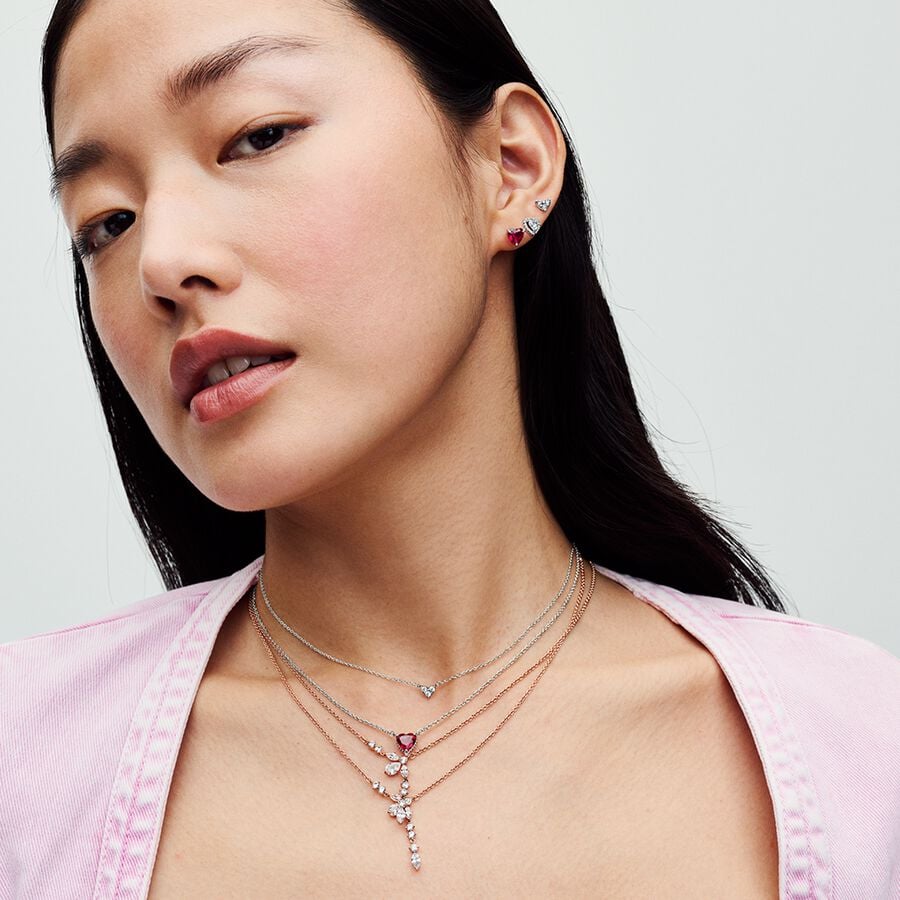 Red Heart Stud Earrings - Pandora West Africa Earrings Turn up the romance with our Red Heart Stud Earrings. Heart-shaped faceted red man-made crystals sparkle in a sterling silver three-prong setting. Make a bold declaration of love and pair this set with other heart pieces. 292549C01  